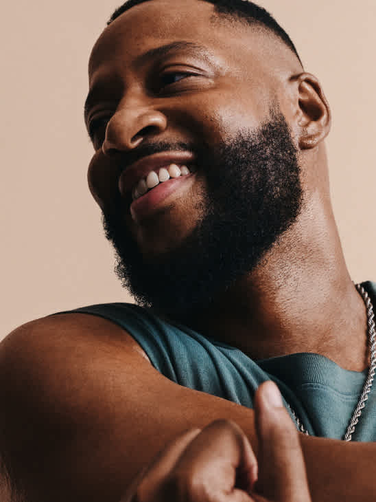 Smiling man with a beard