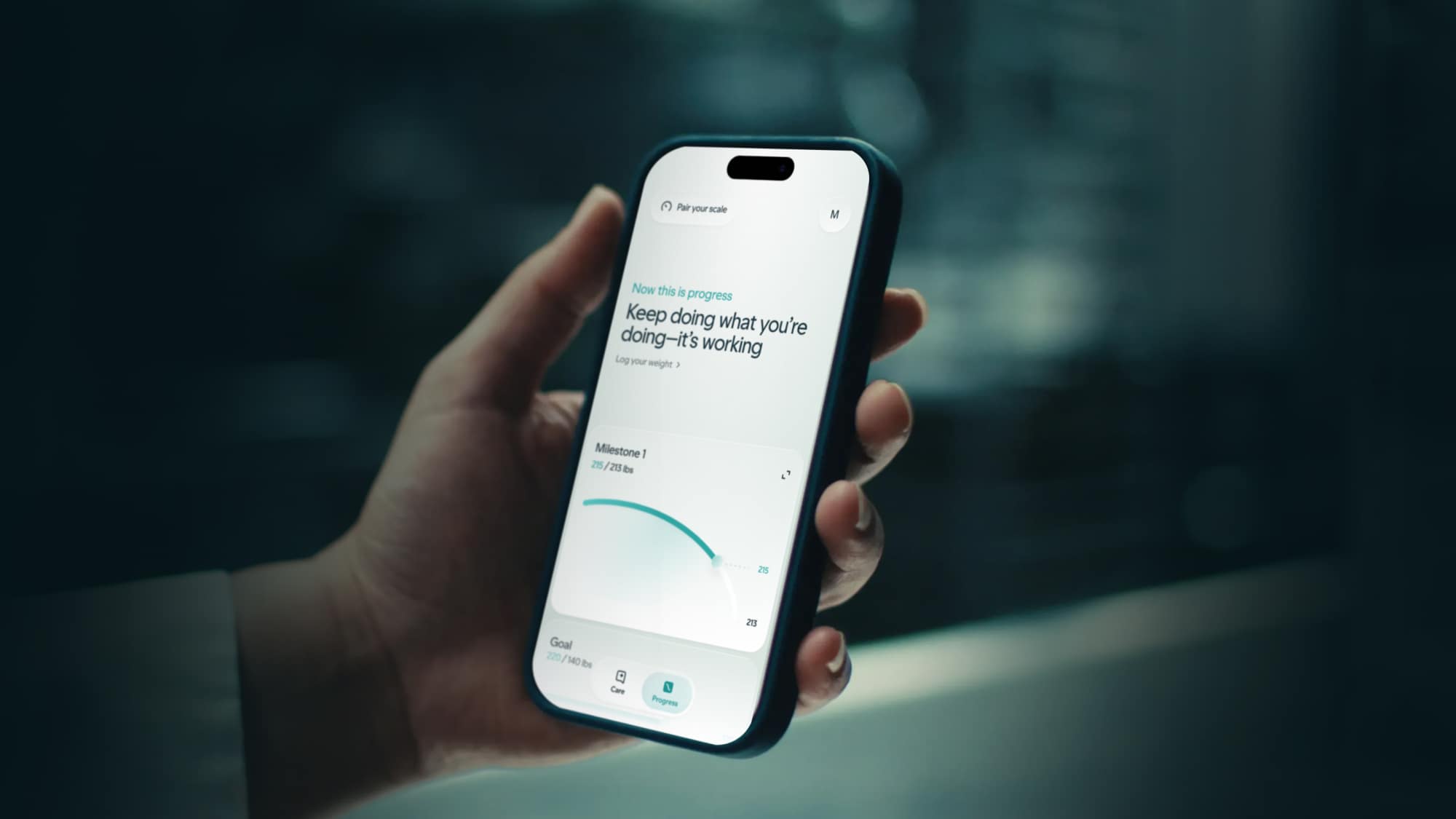 Member tracking her weight loss progress in the Hers app