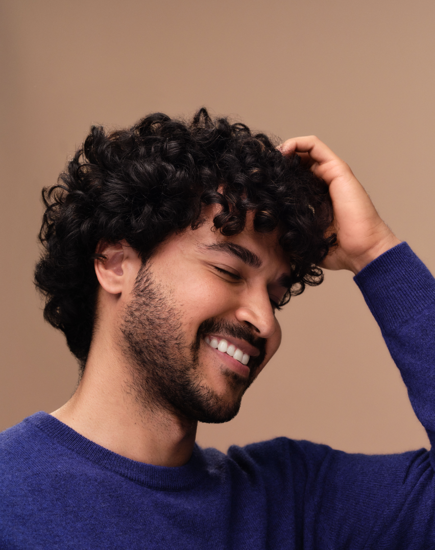 man holding his hair